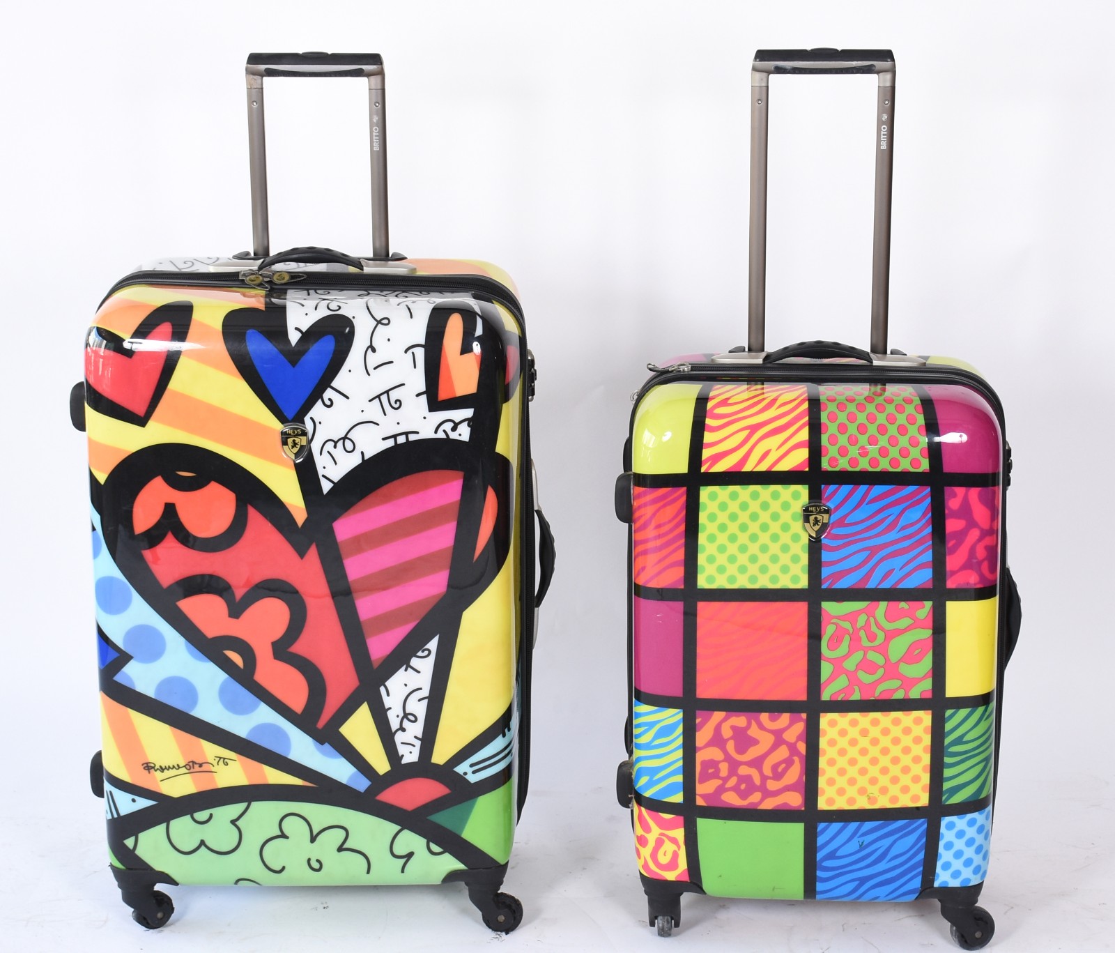 Duas malas "Romero Britto" -"Heys" com desgastes nas rodinhas, um... - foto 1 de 11