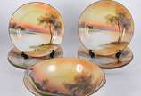 Conjunto para sobremesa de porcelana japonesa N... - Conjunto para sobremesa de porcelana japonesa Noritake, decorados com paisagem em policromia, composto de saladeira 6 pratos. Total: 7 peças.