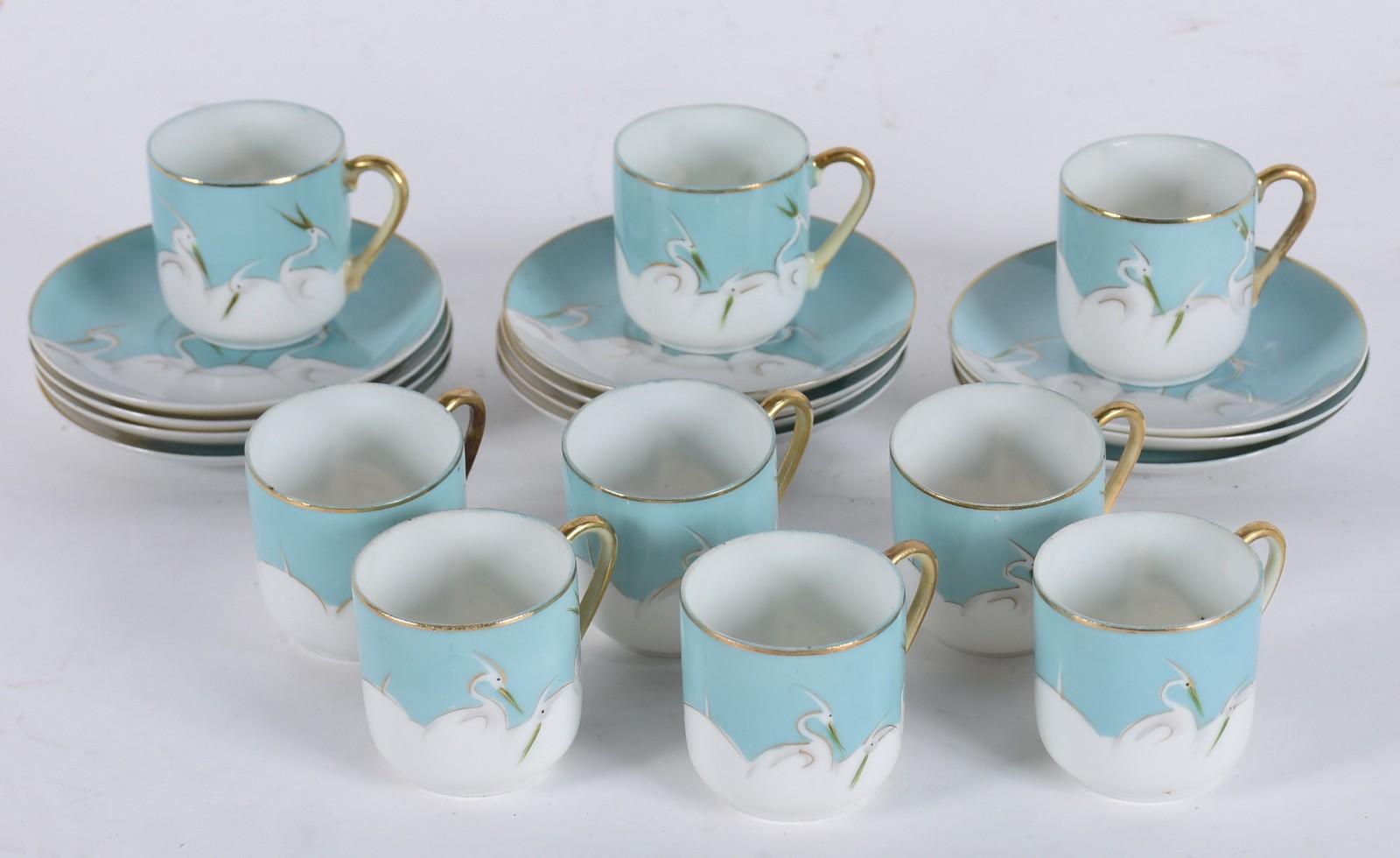 Conjunto de porcelana japonesa azul composto de: 9 xícaras com pires. - foto 1 de 4
