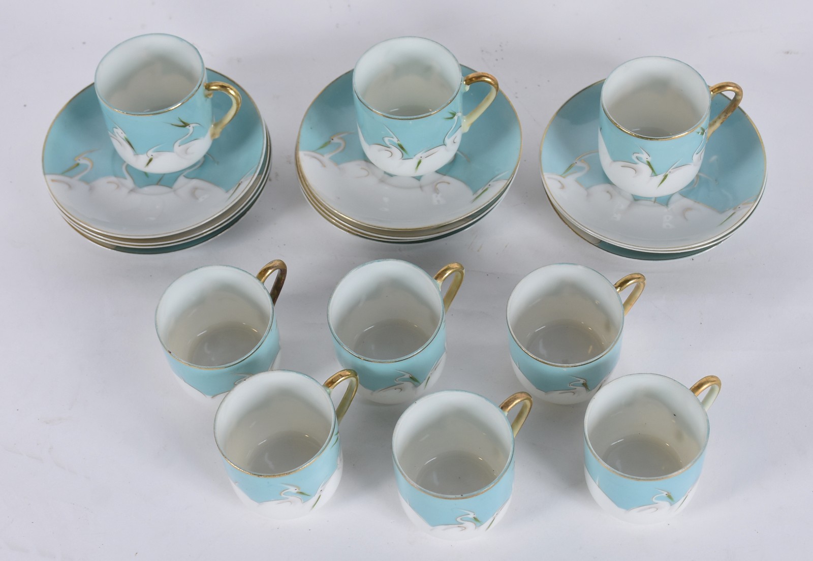 Conjunto de porcelana japonesa azul composto de: 9 xícaras com pires. - foto 3 de 4
