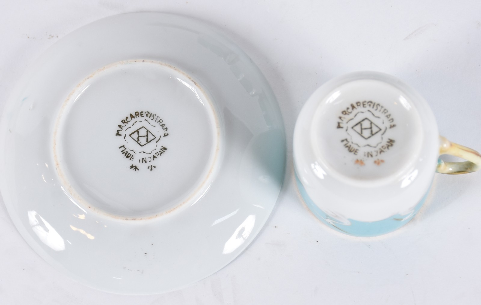 Conjunto de porcelana japonesa azul composto de: 9 xícaras com pires. - foto 4 de 4