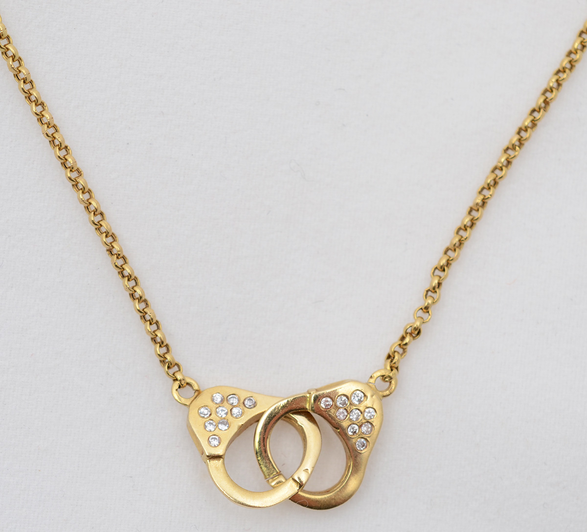 Gargantilha de ouro amarelo 18 k com 18 brilhantes e detalhe em... - foto 1 de 2
