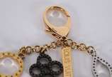 Louis Vuitton (1854), Bijoux Sac Tapage Bag Charm - Este é um autêntico chaveiro da Louis Vuitton Bijoux em um metal de latão dourado e prata. É um pingente de bolsa fabuloso para complementar sua ...