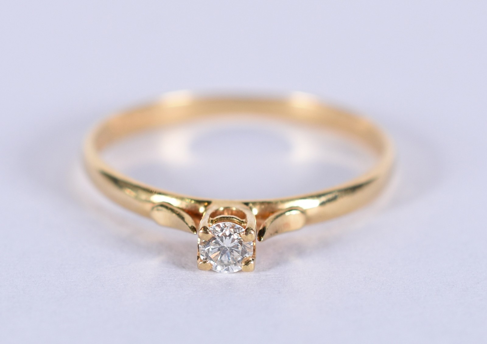 Solitário de ouro 18k, contraste 750 com um brilhante de 0,10 ct, aro... - foto 1 de 4