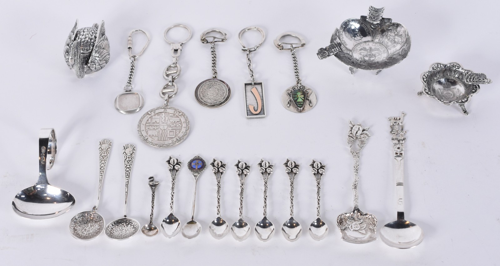 Diversas miniatura de prata, sendo: cisne, 2 cinzeiros, 5 chaveiros e... - foto 1 de 9
