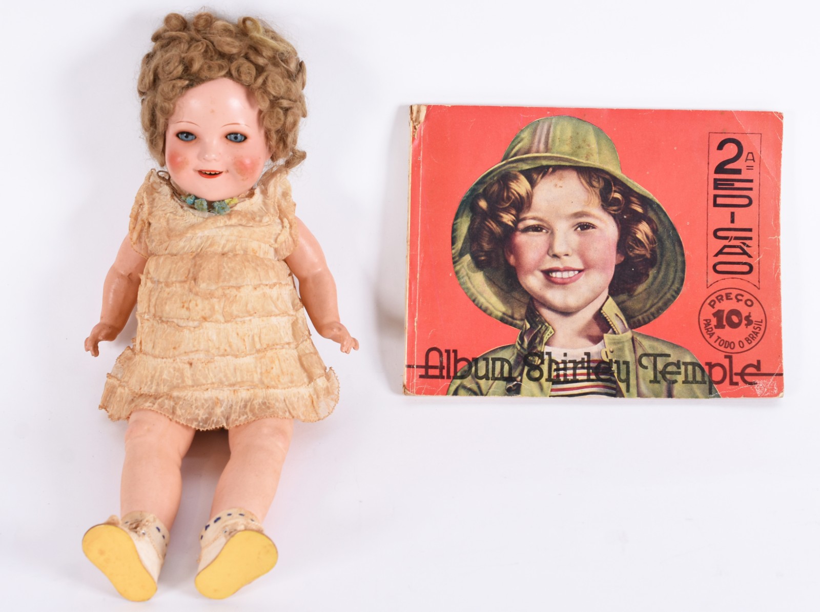 Brinquedo antigo - Boneca "Shirley Temple", acompanha o álbum com... - foto 1 de 10
