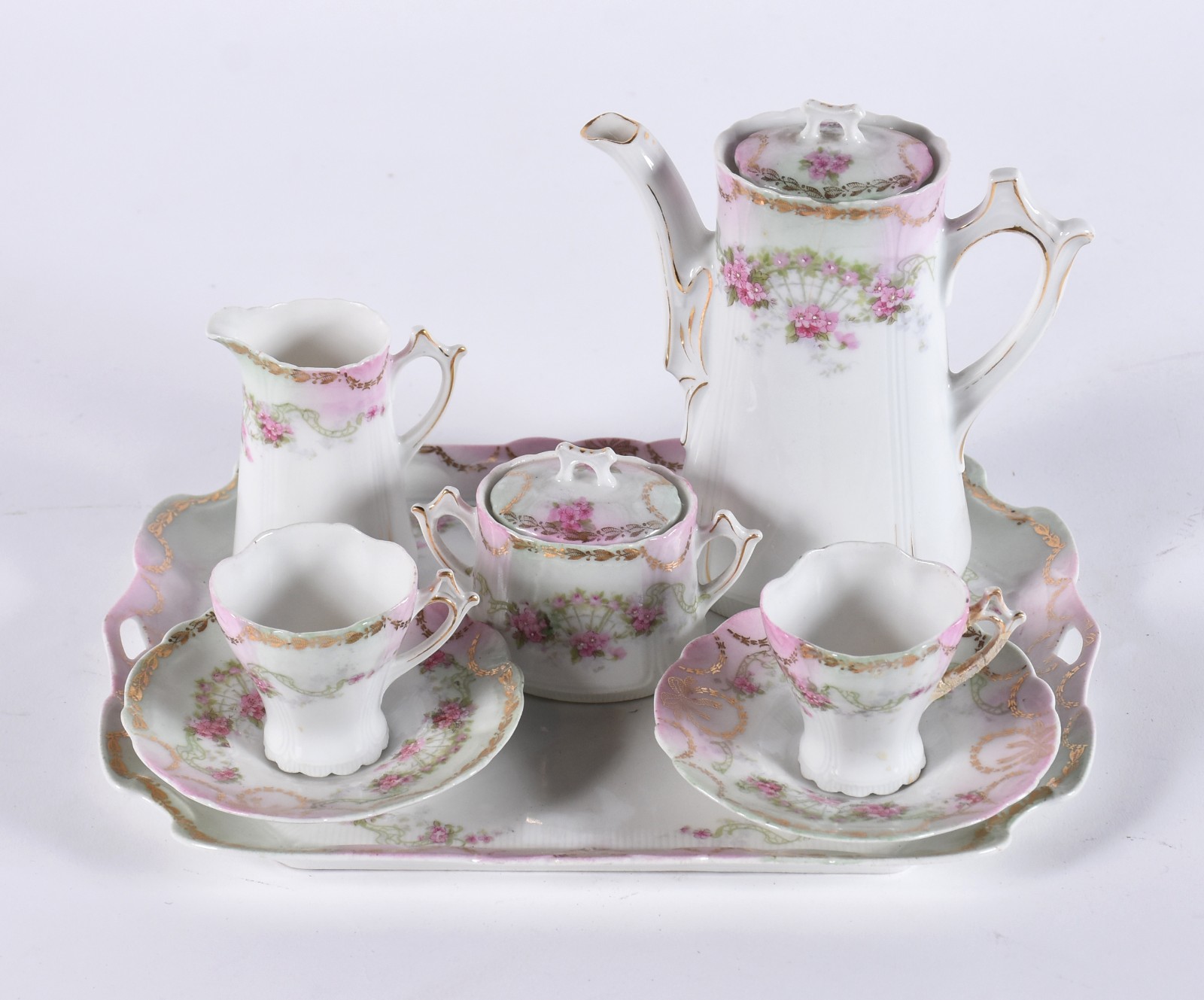 Tête-à-tête de porcelana branca decorada com guirlandas florais com... - foto 1 de 5