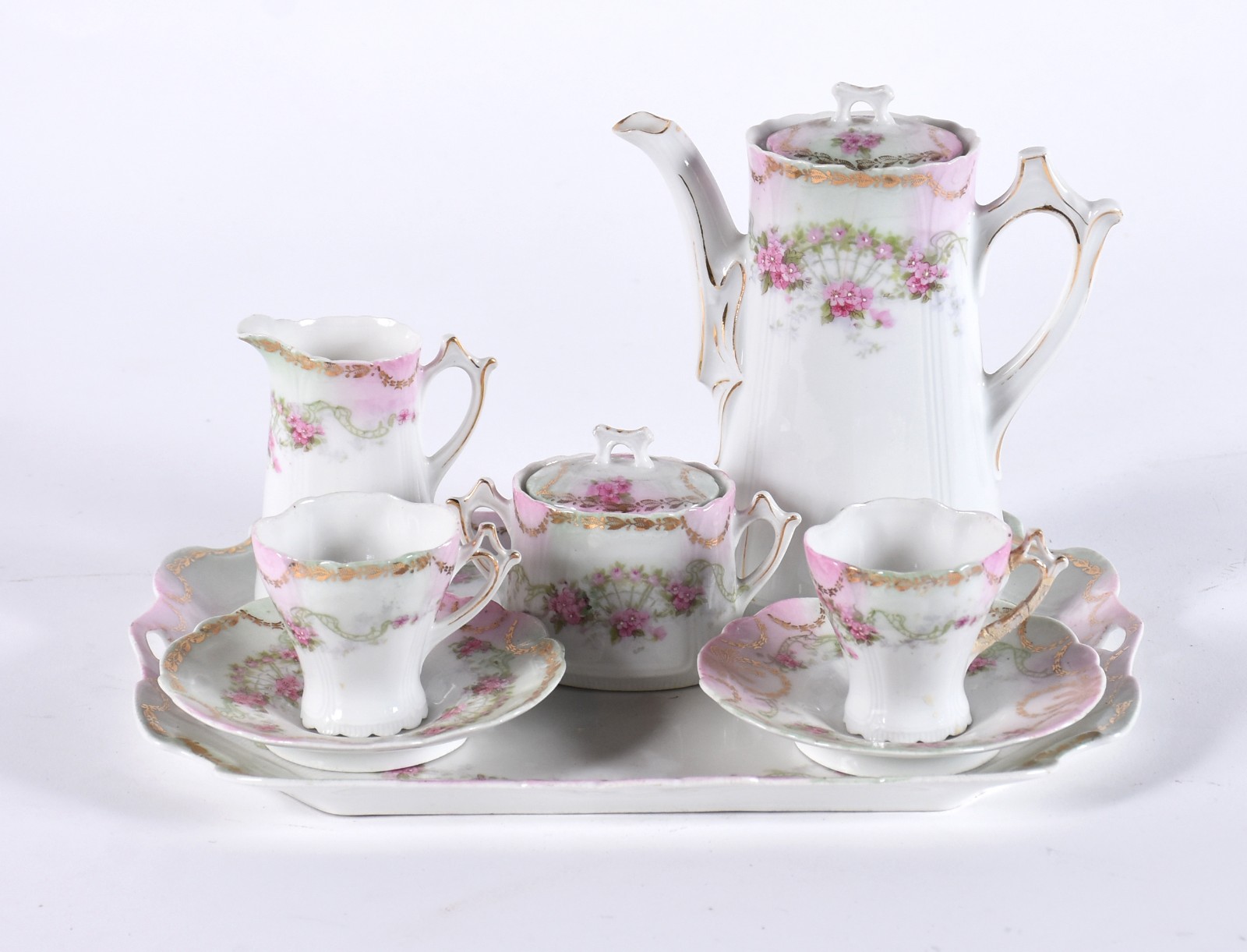 Tête-à-tête de porcelana branca decorada com guirlandas florais com... - foto 2 de 5