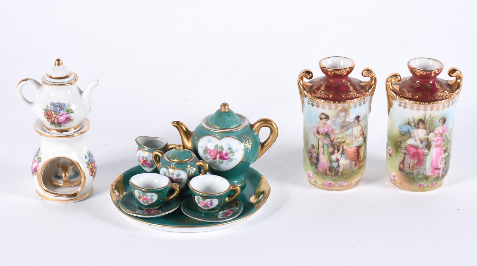 Diversas miniaturas de porcelana, sendo : tete a tete com 6 peças na... - foto 1 de 9