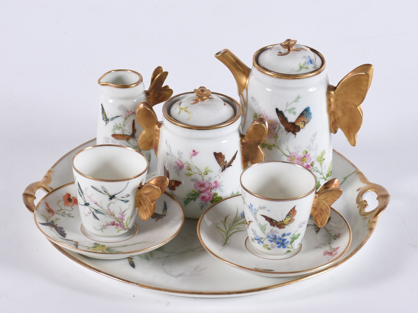 Tête-à-tête de porcelana francesa decorada com borboletas e flores em... - foto 1 de 7
