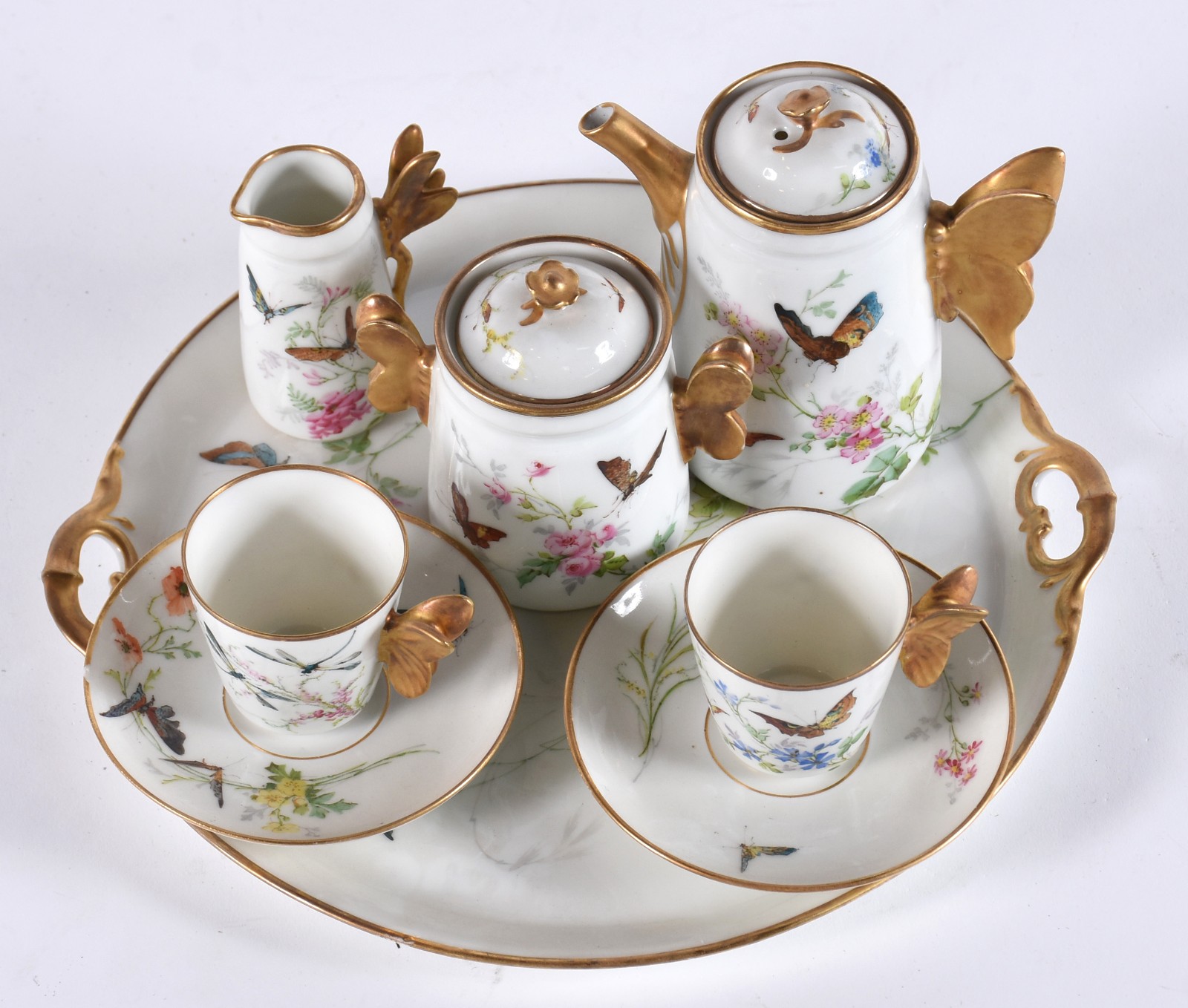 Tête-à-tête de porcelana francesa decorada com borboletas e flores em... - foto 3 de 7