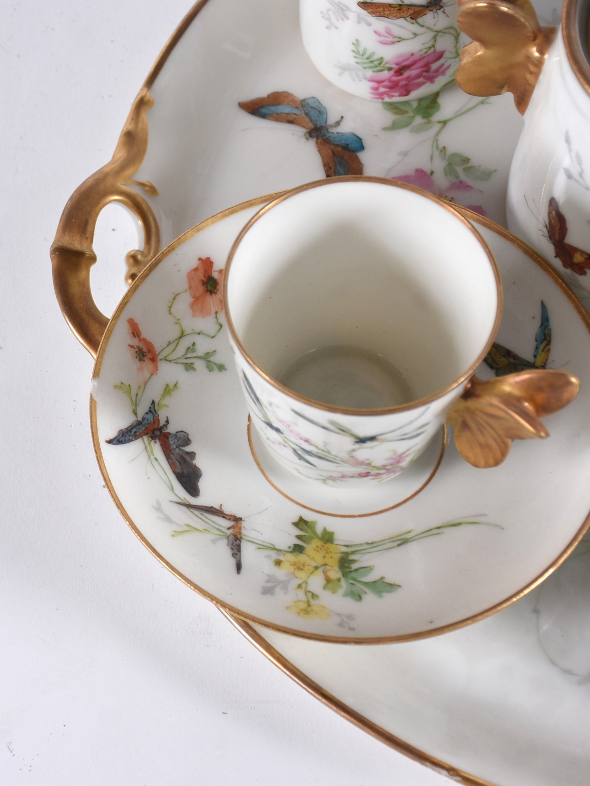 Tête-à-tête de porcelana francesa decorada com borboletas e flores em... - foto 5 de 7