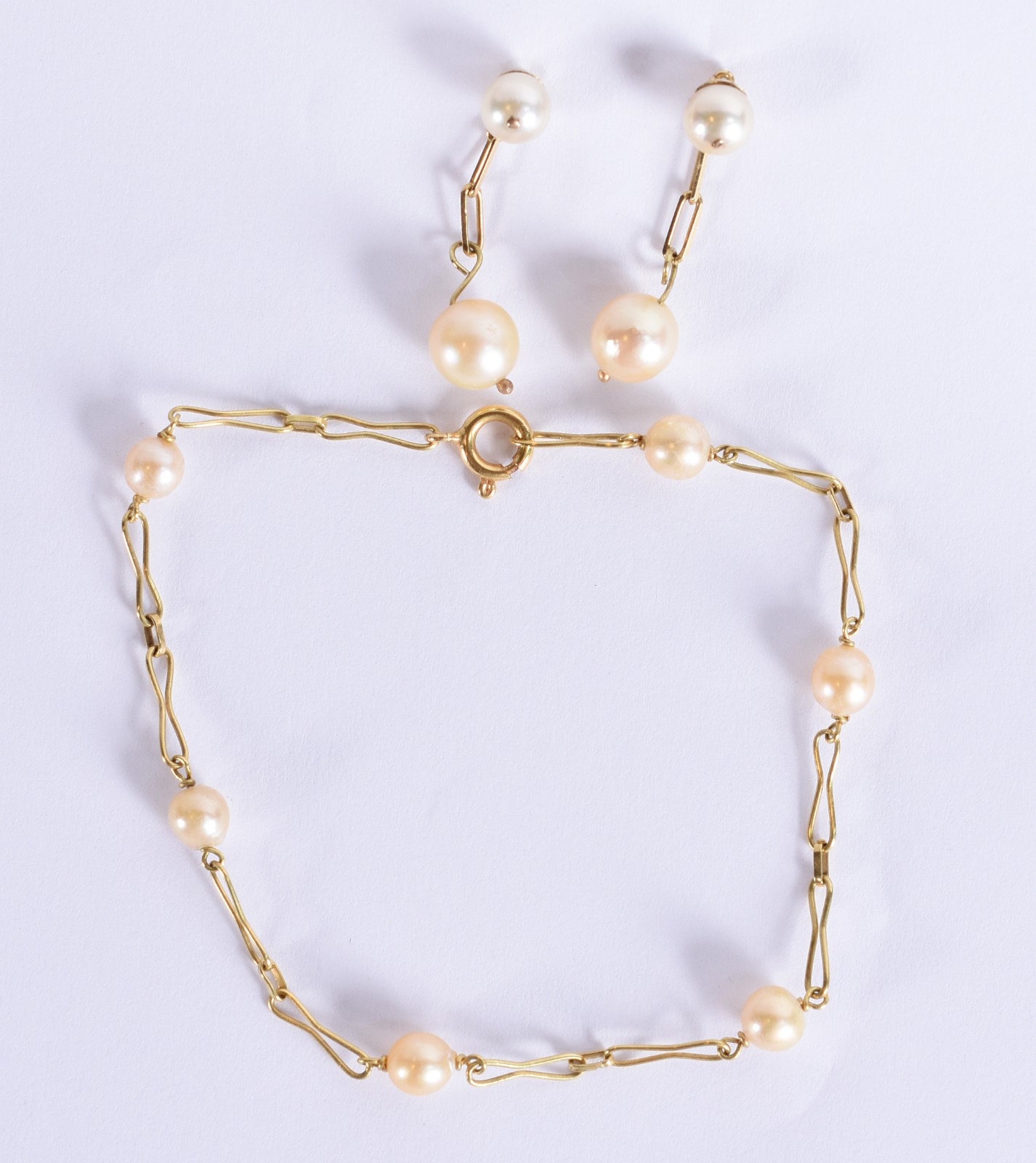 Conjunto de ouro 18k composto de pulseira com 6 perolas e par de... - foto 2 de 4
