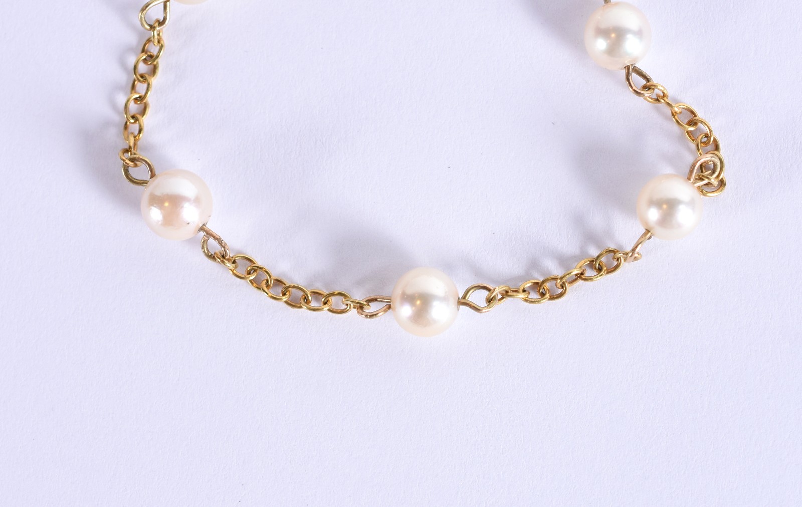 Pulseira de ouro 18k com 6 perolas intercaladas (Por motivos de... - foto 1 de 3