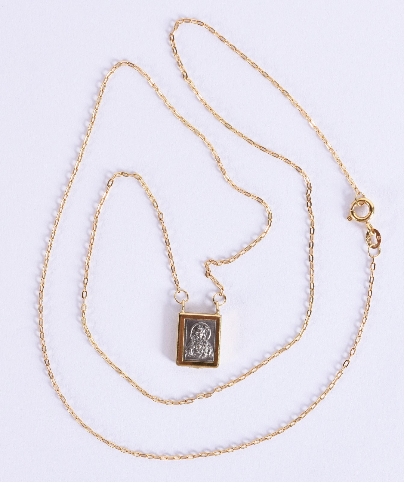Cordão de ouro 18k com um pendente com relevo do coração de Jesus... - foto 3 de 7