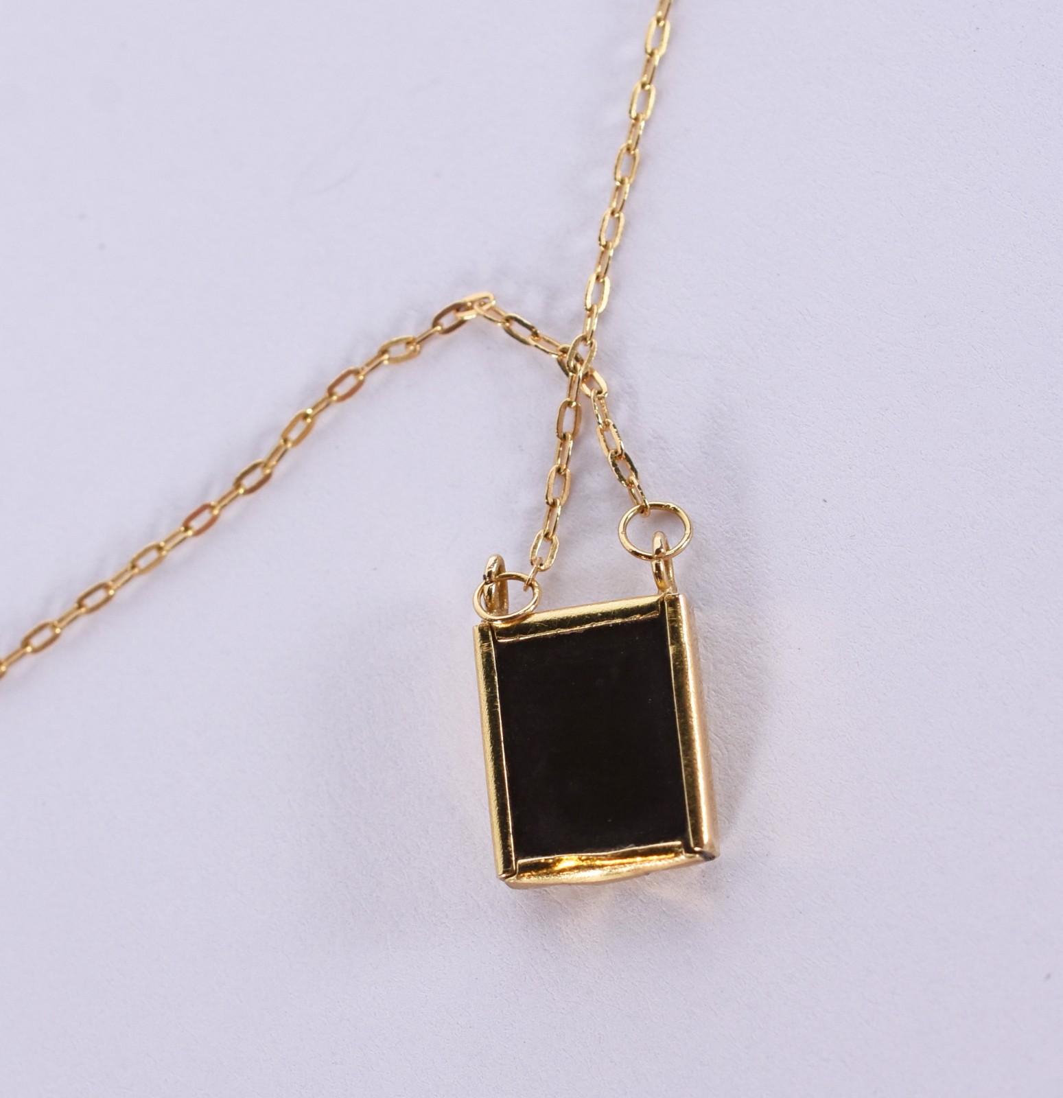 Cordão de ouro 18k com um pendente com relevo do coração de Jesus... - foto 6 de 7