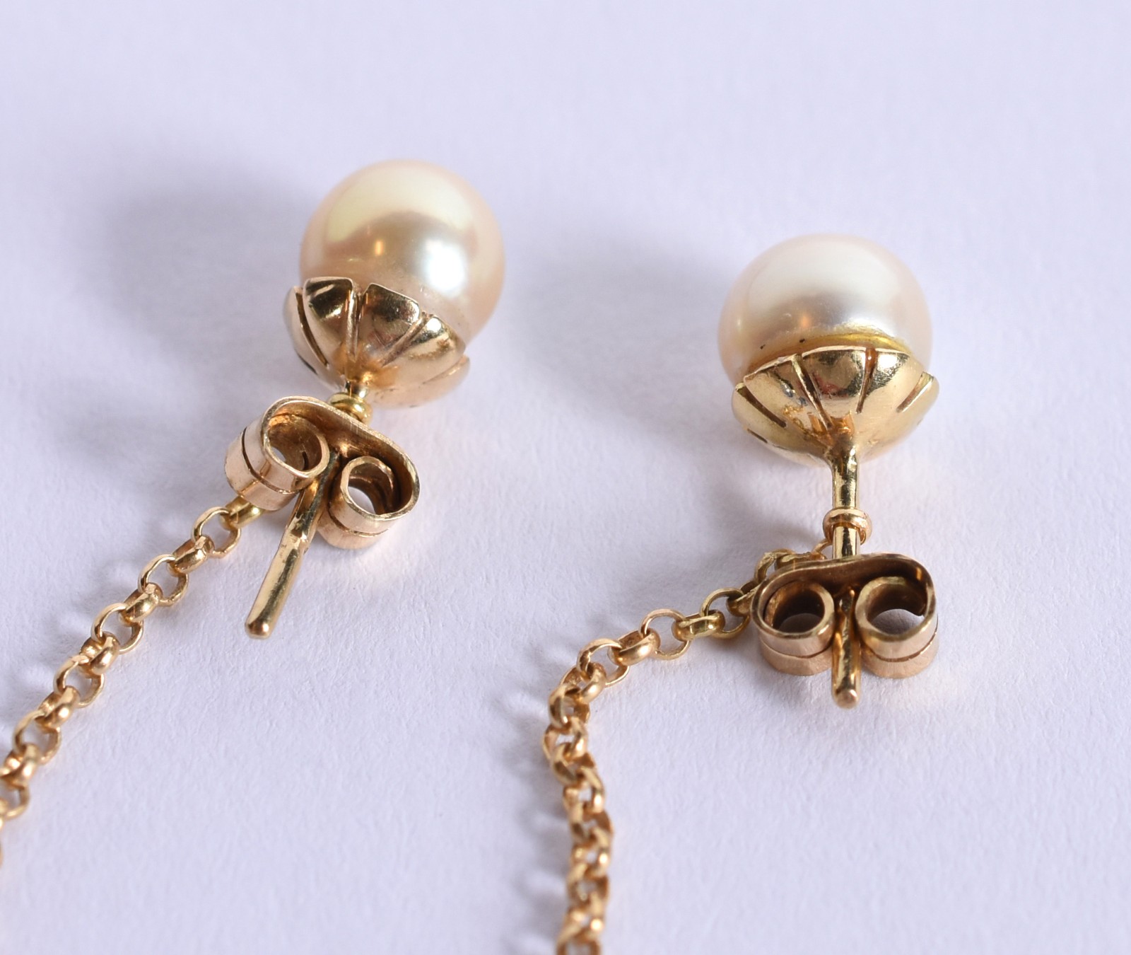 Brinco de ouro 18k, correntinha com gota de topázio azul (Por motivos... - foto 2 de 3