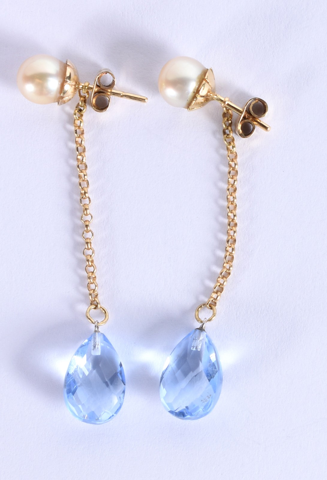 Brinco de ouro 18k, correntinha com gota de topázio azul (Por motivos... - foto 3 de 3
