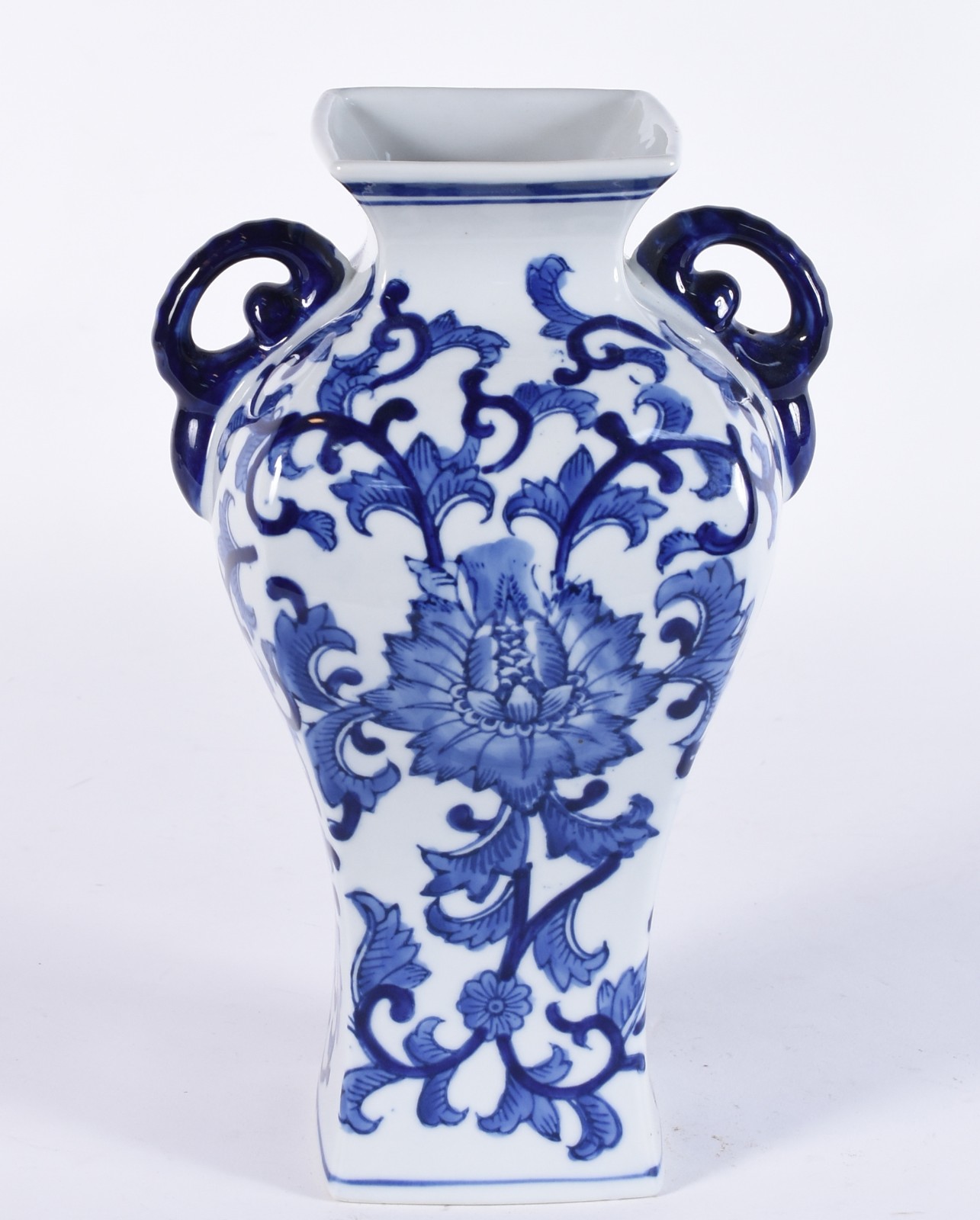 Ânfora de porcelana branca com detalhes azuis. - foto 1 de 4