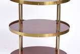 Elegante mesa de madeira nobre feitio oval com ... - Elegante mesa de madeira nobre feitio oval com 3 platôs ligados por hastes e cercaduras de metal dourado.