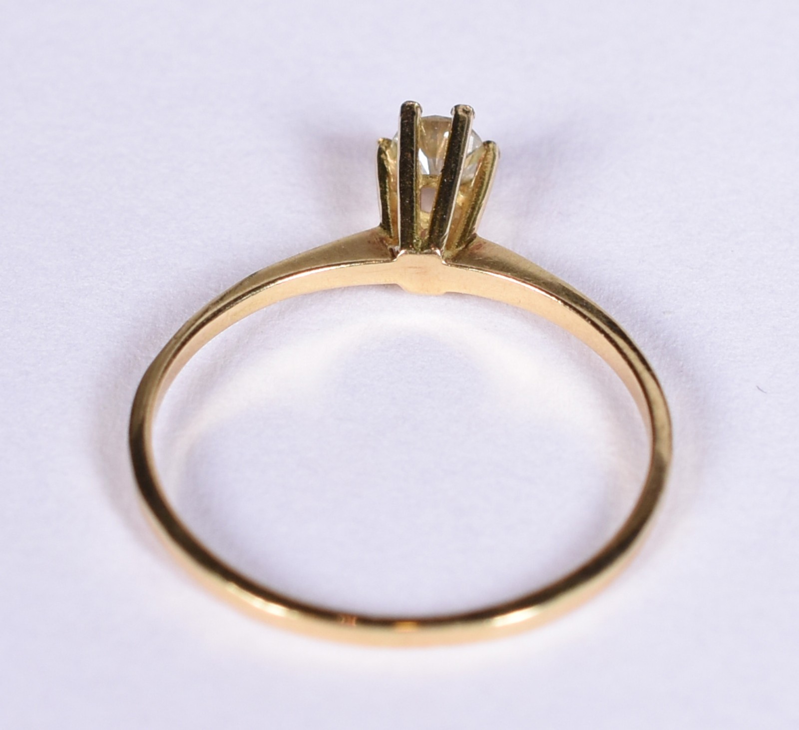 Solitário de ouro 18k, contraste 750 com um brilhante de 0,20 ct, aro... - foto 2 de 4