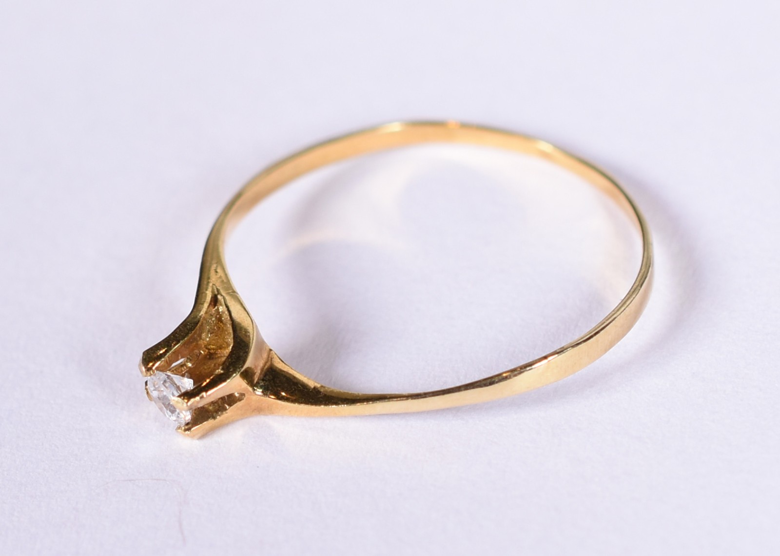 Solitário de ouro 18k contraste 750 e safira branca, aro 11 (Por... - foto 2 de 5