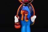 Estatueta em murano rep. Palhaço na cor turques... - Estatueta em murano rep. Palhaço na cor turquesa. Alt. 29 cm