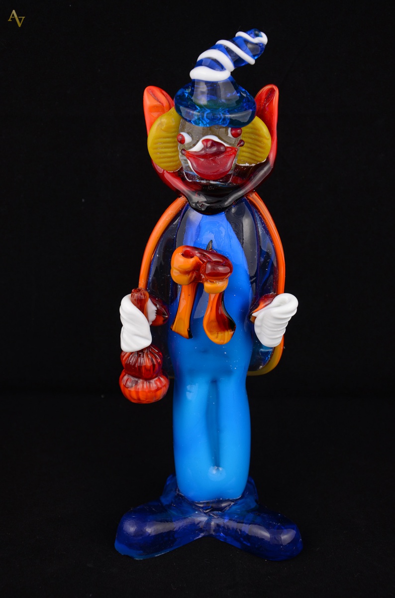 Estatueta em murano rep. Palhaço na cor turquesa. Alt. 29 cm - foto 1 de 2
