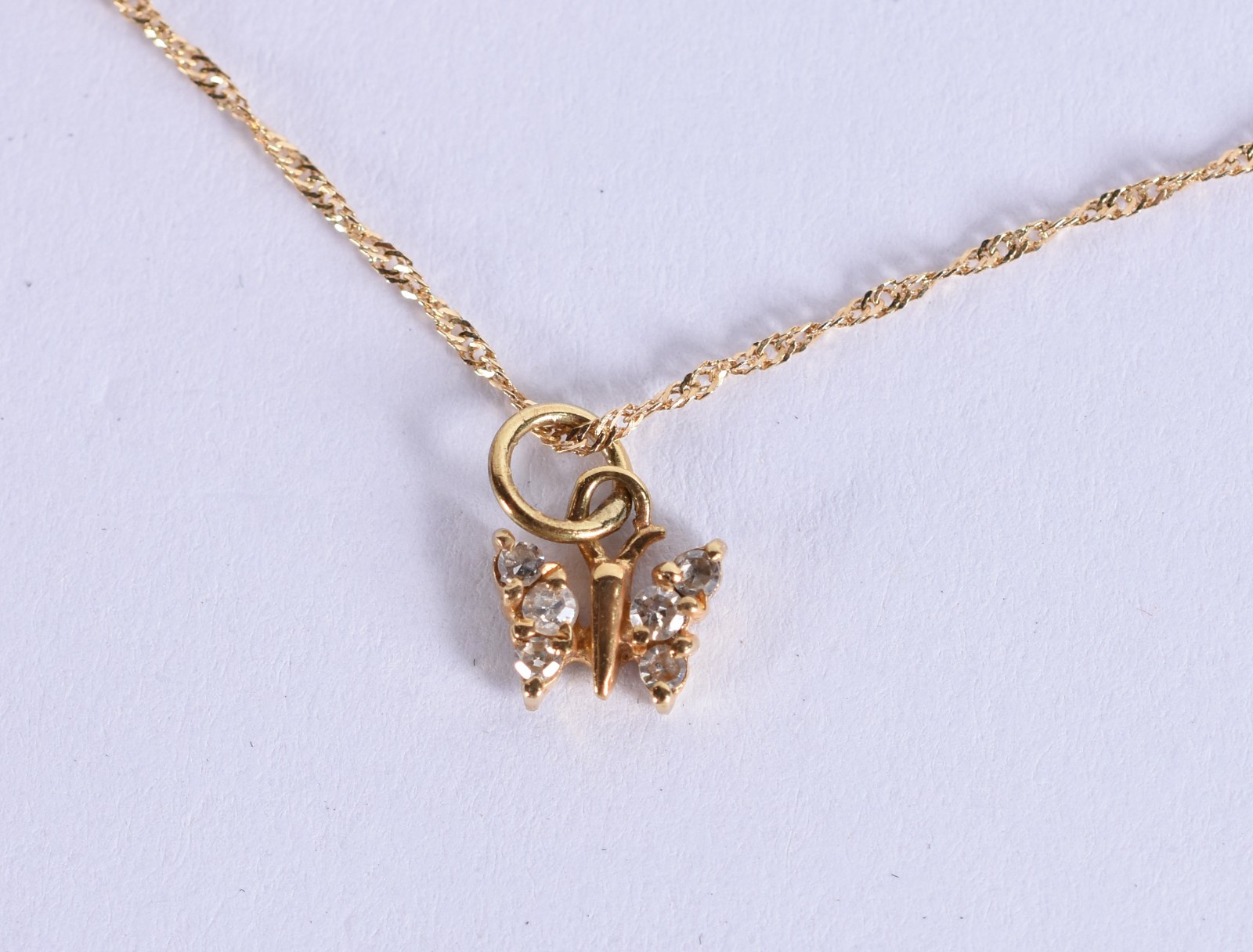 Cordão e pingente em ouro 18k, contraste 750 modelo torcido com... - foto 2 de 5