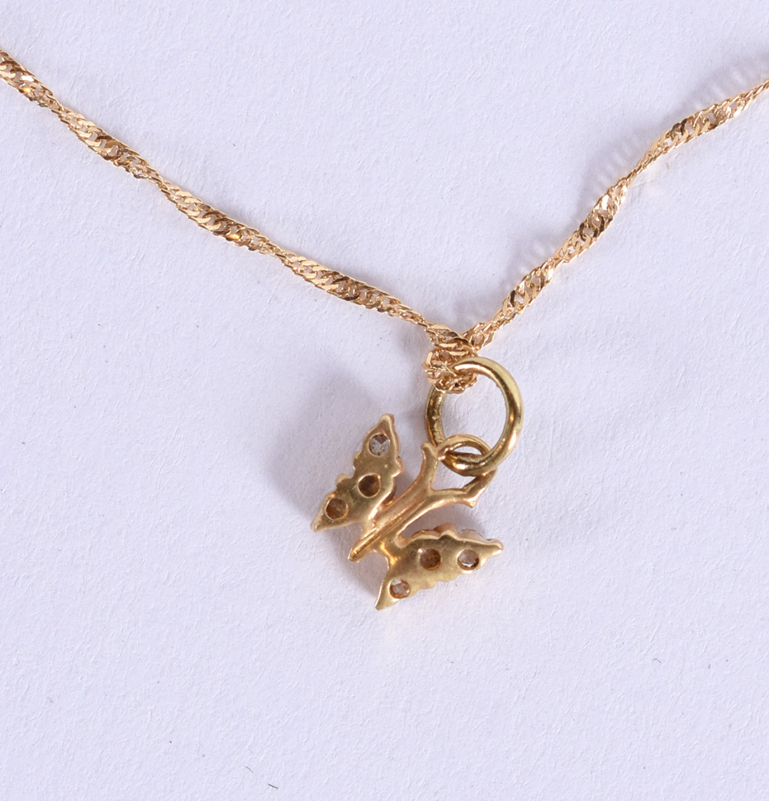 Cordão e pingente em ouro 18k, contraste 750 modelo torcido com... - foto 5 de 5