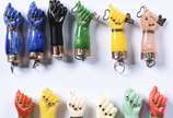 Doze figas diversas com detalhes de prata com v... - Doze figas diversas com detalhes de prata com vermeil.