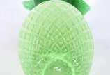 Abacaxi de vidro decorativo na cor verde. - Abacaxi de vidro decorativo na cor verde.