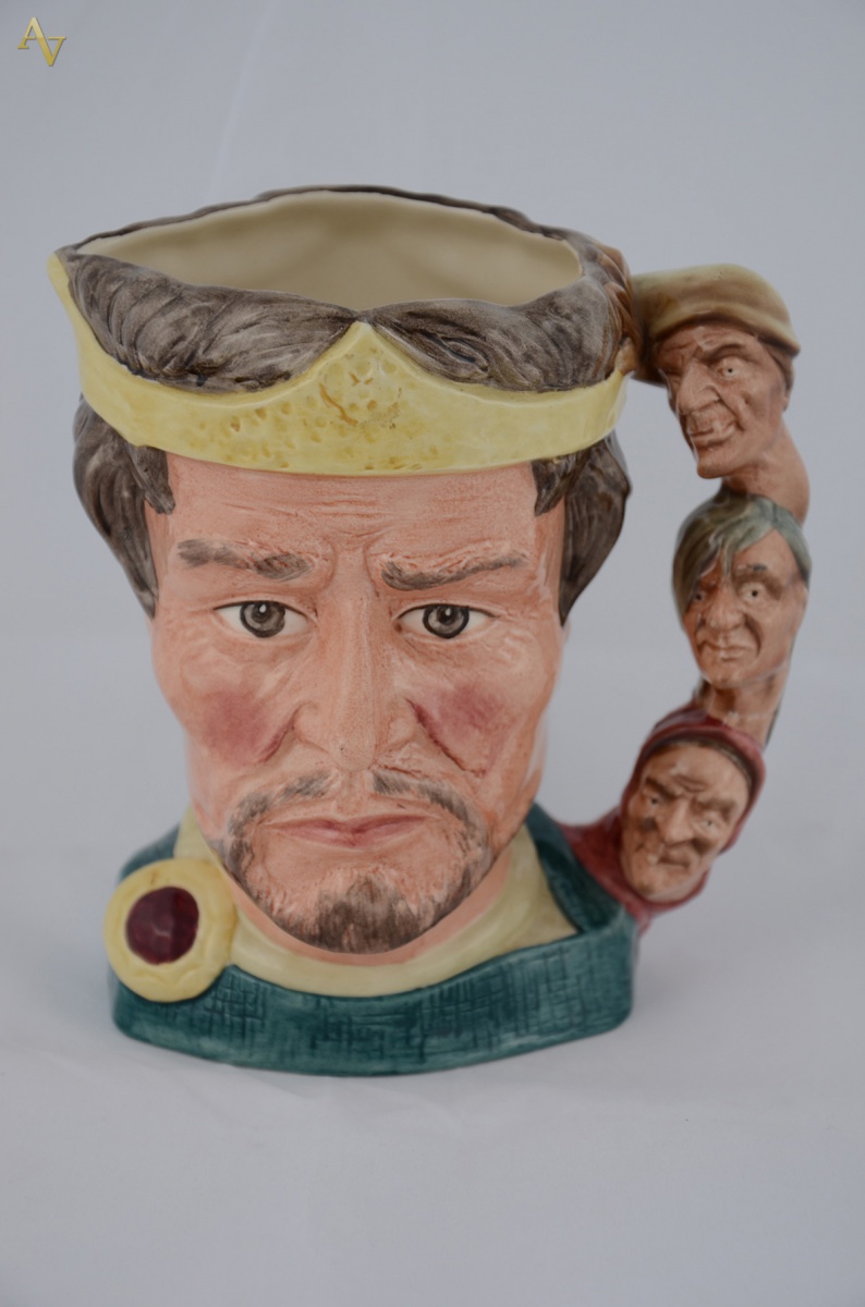 Caneca de faiança inglesa Royal Doulton, policromada, repres. rosto... - foto 1 de 2