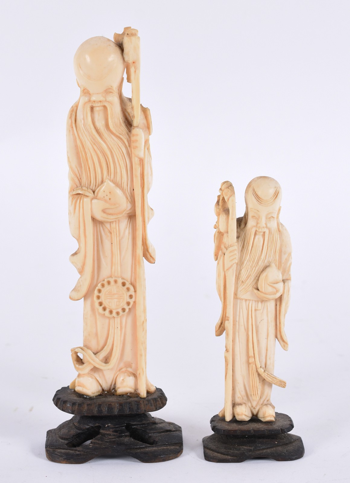 Duas estatuetas de marfim representando "sábios", bases de madeira. - foto 1 de 4