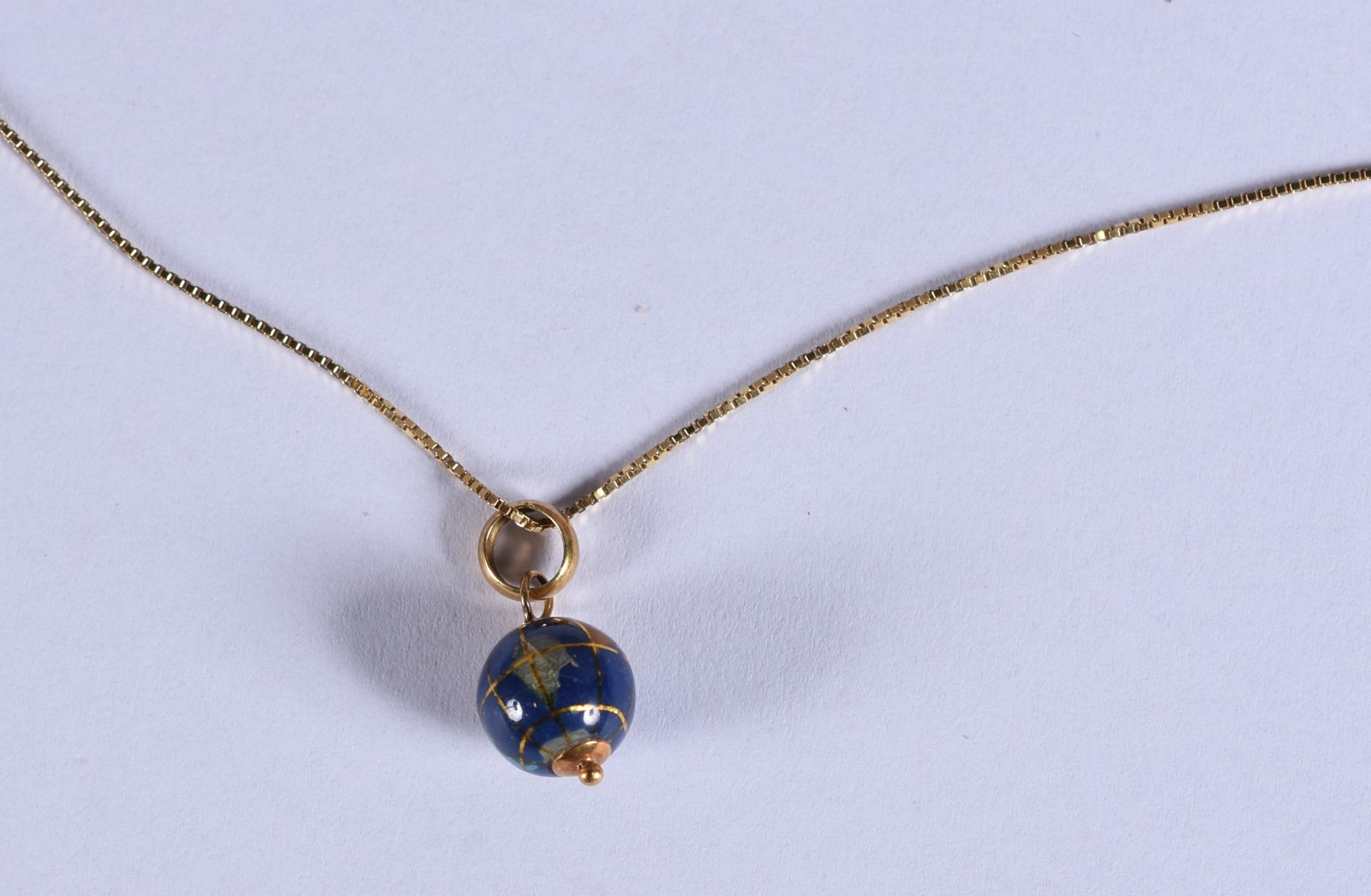Colar de ouro 18k com pingente feitio globo (Por motivos de segurança... - foto 1 de 3