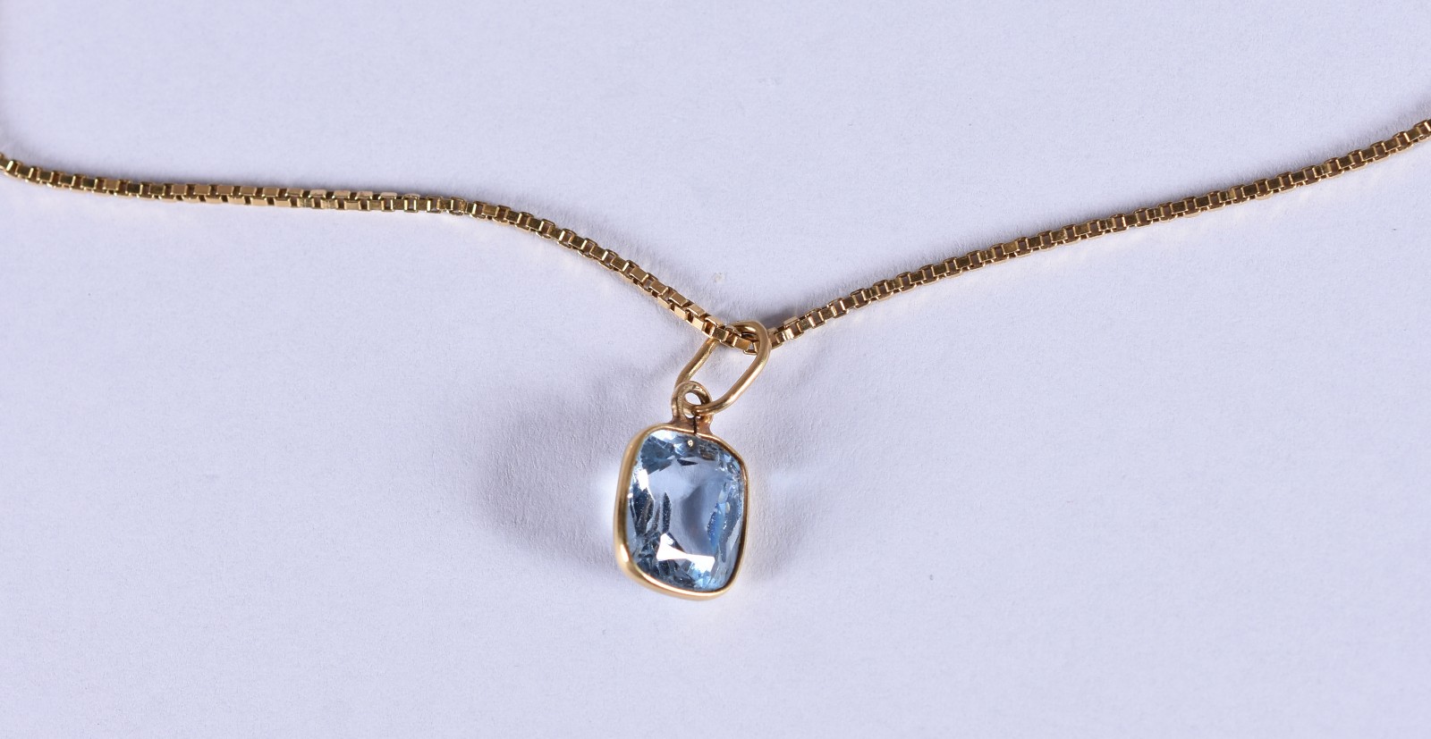 Colar de ouro 18k com pingente com pedras de topázio azul (Por... - foto 1 de 6