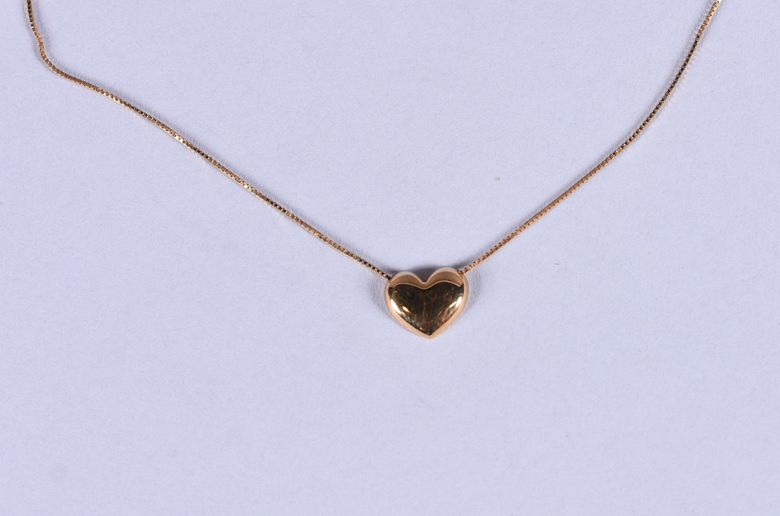 Colar de ouro 18k, contrastado 750 com pingente feitio coração (Por... - foto 1 de 5