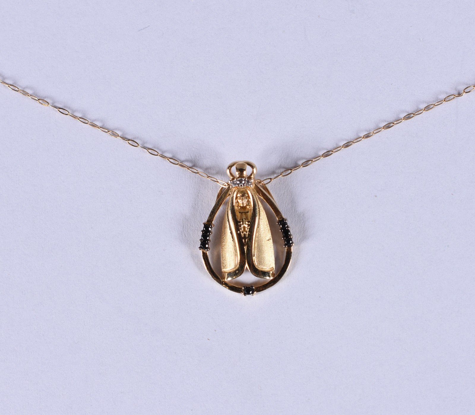 Colar de ouro 18 k, contrastado 750 com pingente de Nossa Senhora... - foto 1 de 4