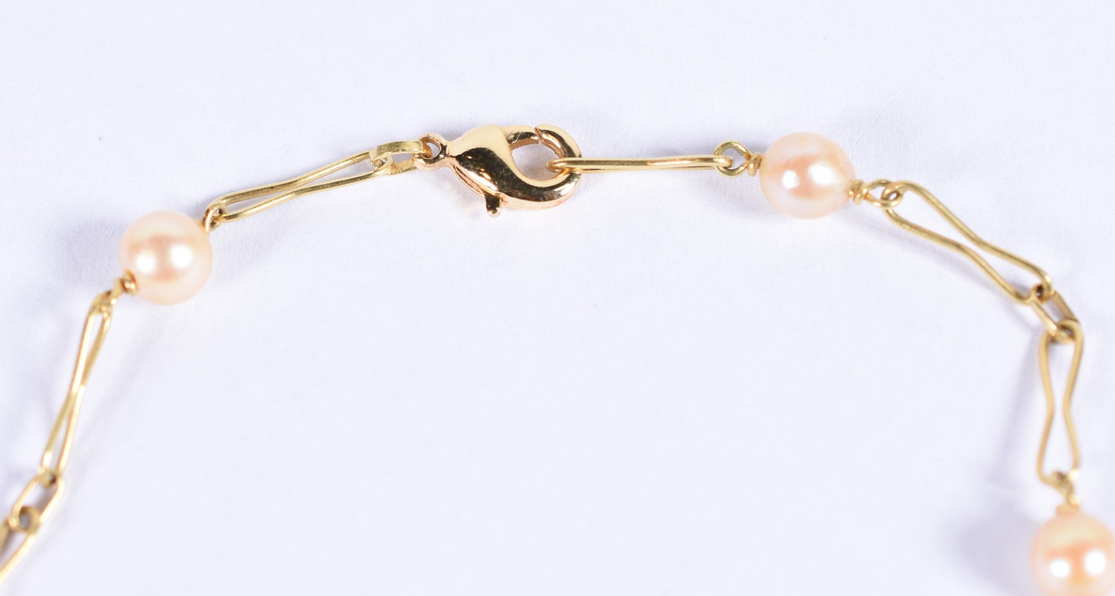 Pulseira de ouro 18k com 6 perolas intercaladas com 2 élos em forma... - foto 3 de 3
