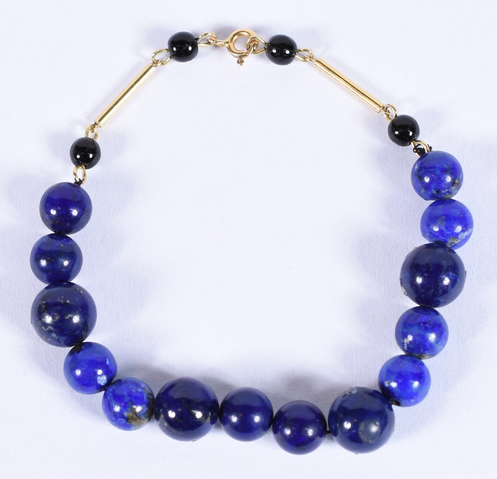 Pulseira com complementos em tiras e fecho de ouro 18k com 4 bolas... - foto 2 de 4