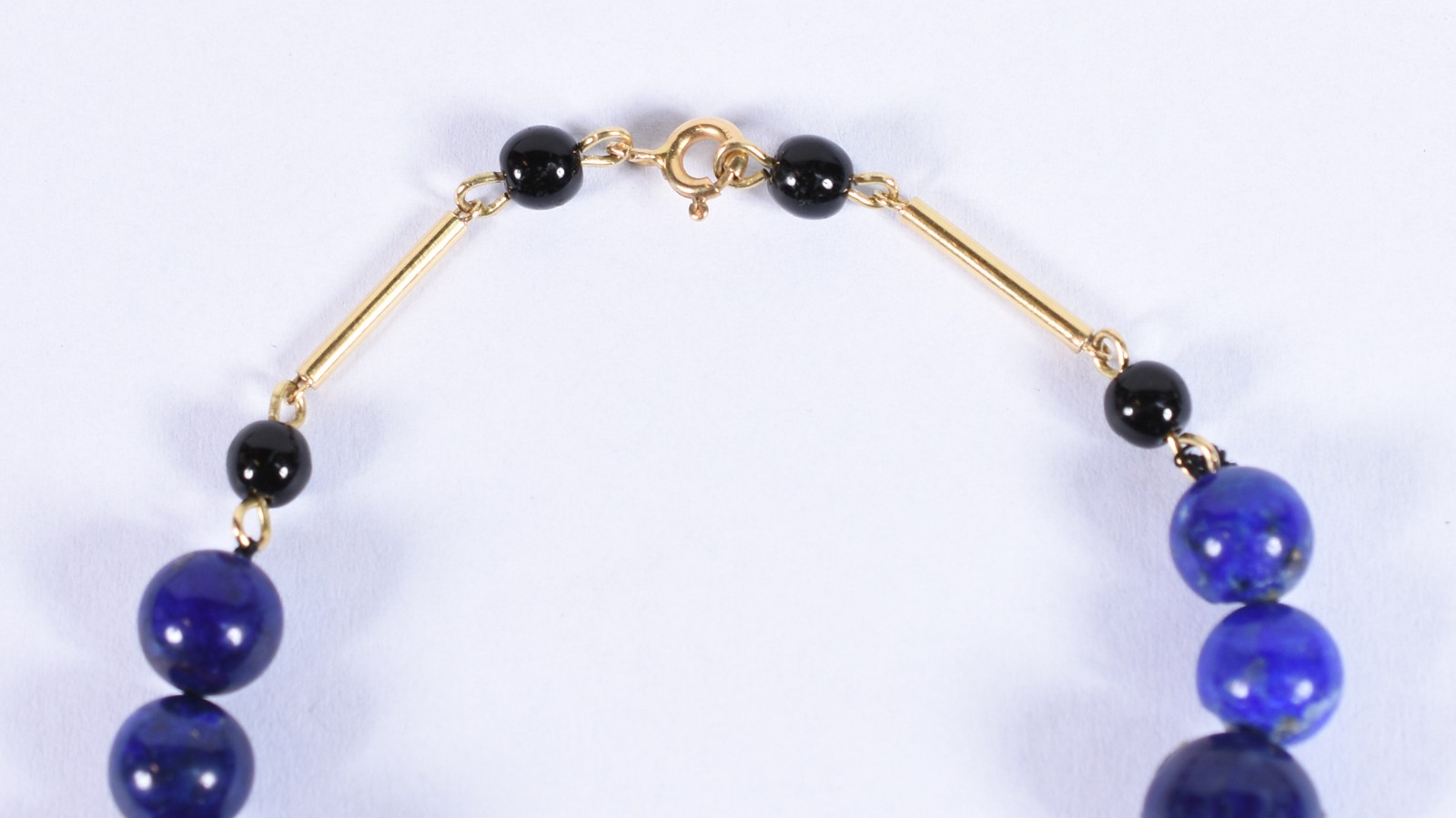 Pulseira com complementos em tiras e fecho de ouro 18k com 4 bolas... - foto 3 de 4