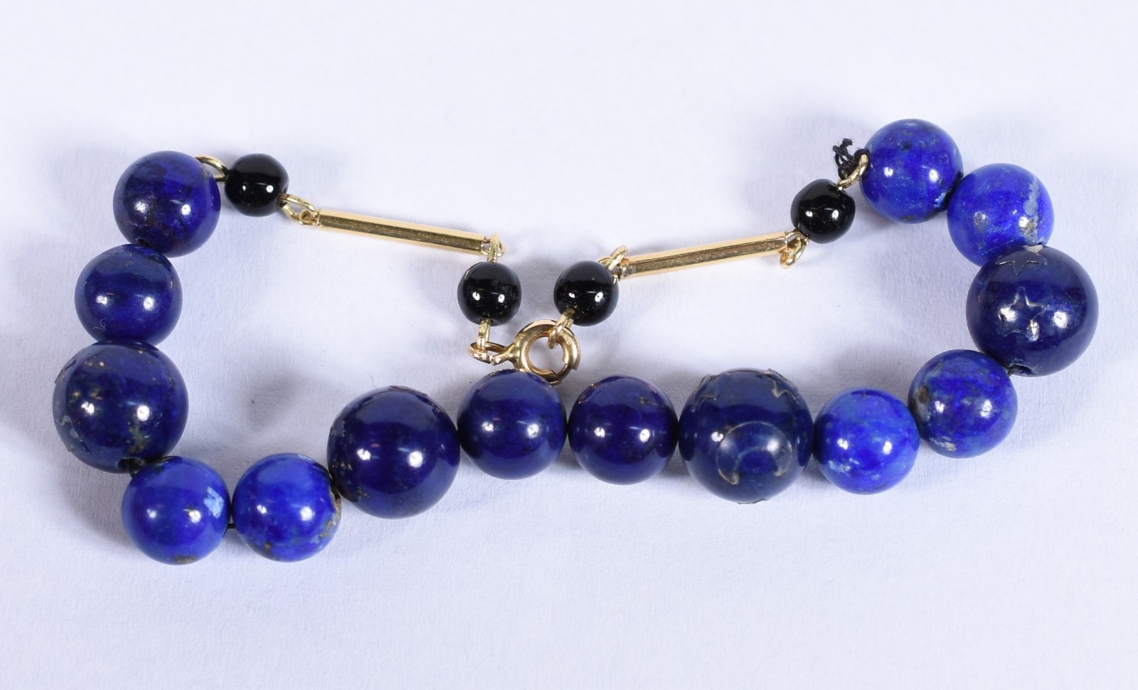 Pulseira com complementos em tiras e fecho de ouro 18k com 4 bolas... - foto 4 de 4