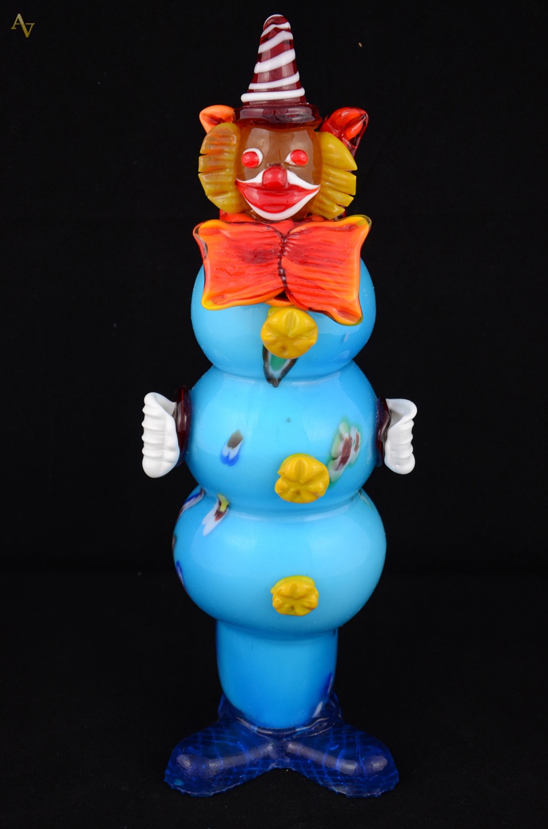 Estatueta em murano rep. Palhaço na cor turquesa. Alt. 33 cm - foto 1 de 2