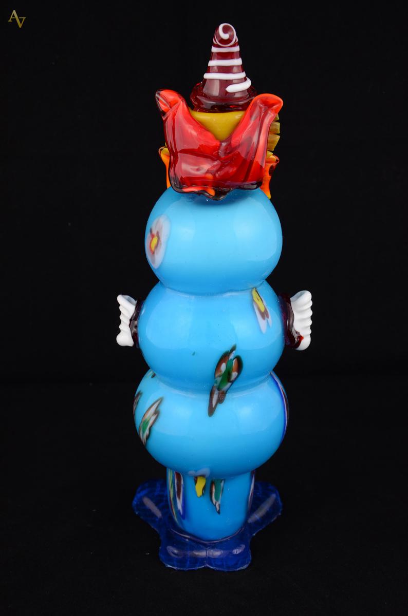 Estatueta em murano rep. Palhaço na cor turquesa. Alt. 33 cm - foto 2 de 2