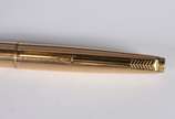 PARKER,  - Caneta dourada.