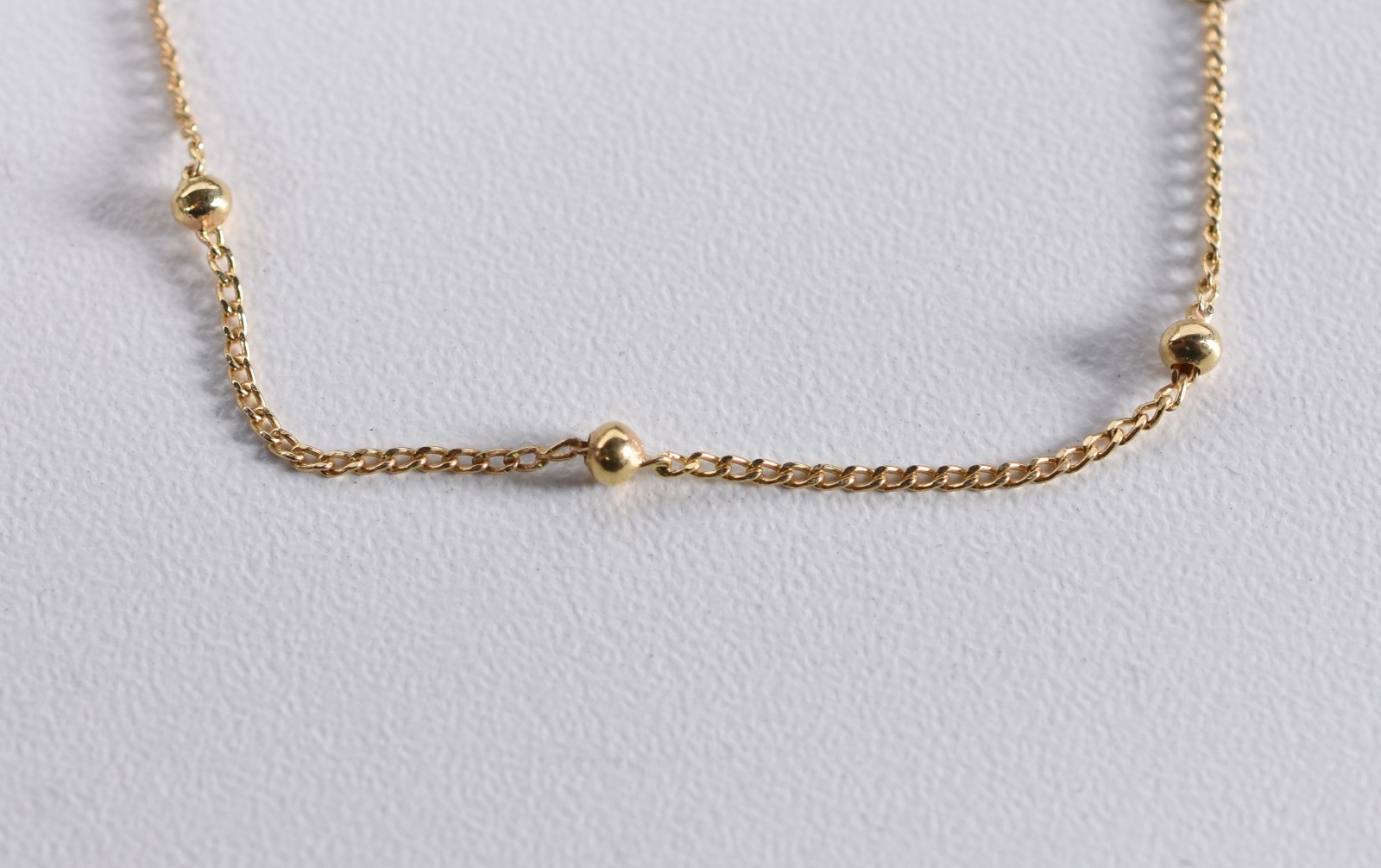 Pulseira de ouro 18k de criança com bolinhas (Por motivos de... - foto 1 de 3