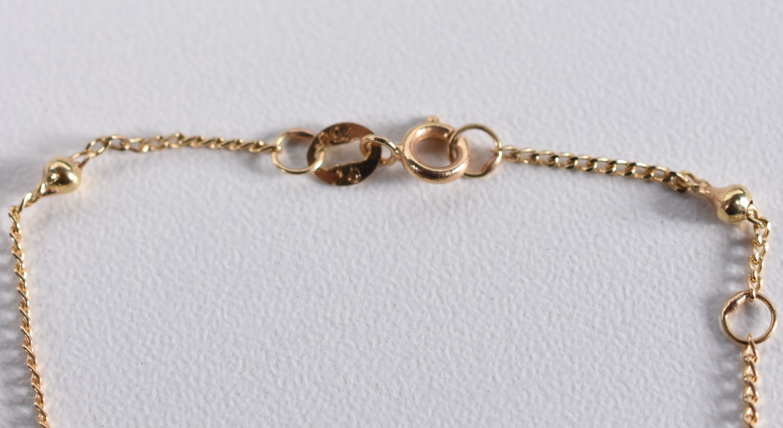Pulseira de ouro 18k de criança com bolinhas (Por motivos de... - foto 3 de 3