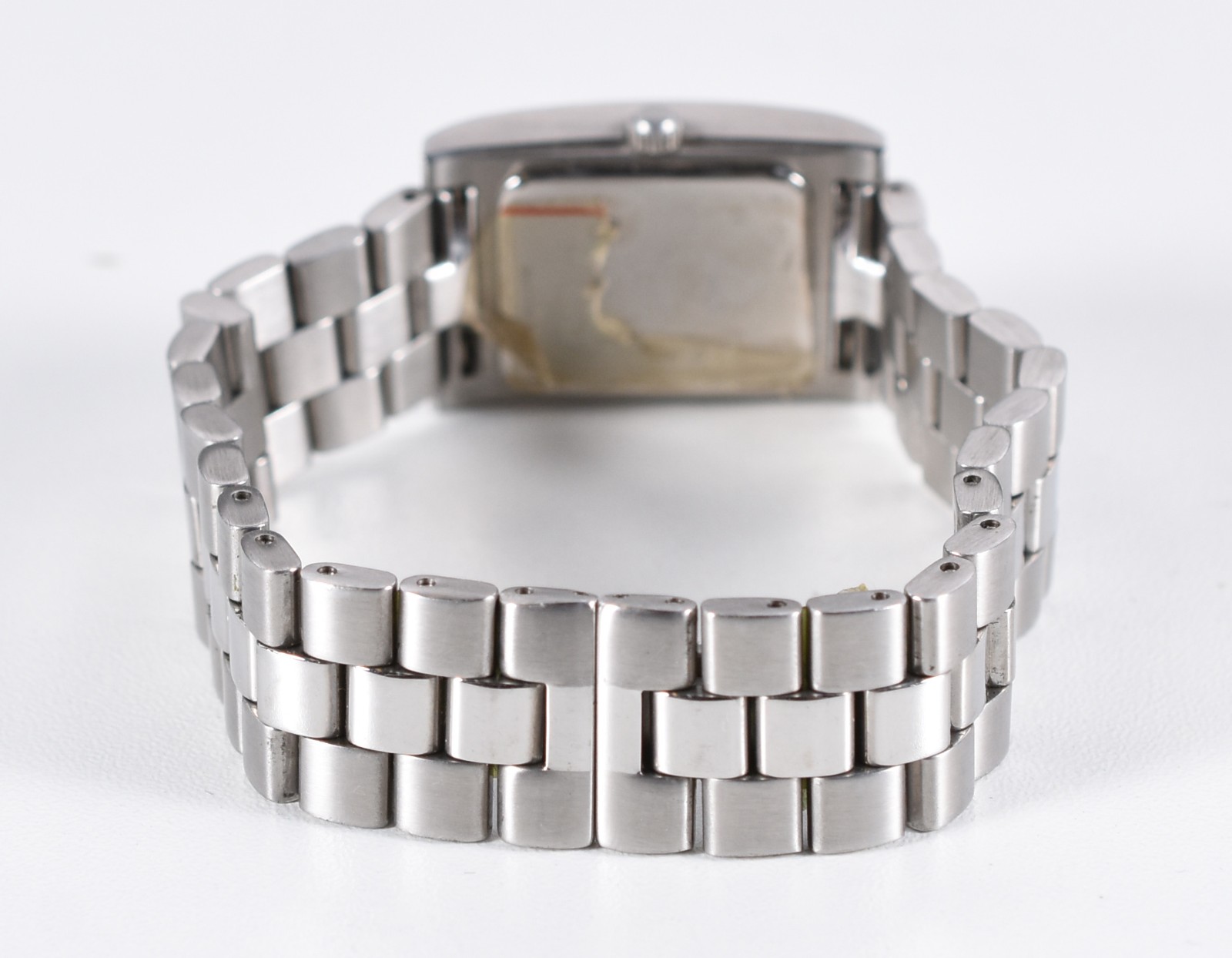 Relógio feminino modelo retangular, pulseira e caixa de aço, fundo... - foto 4 de 5