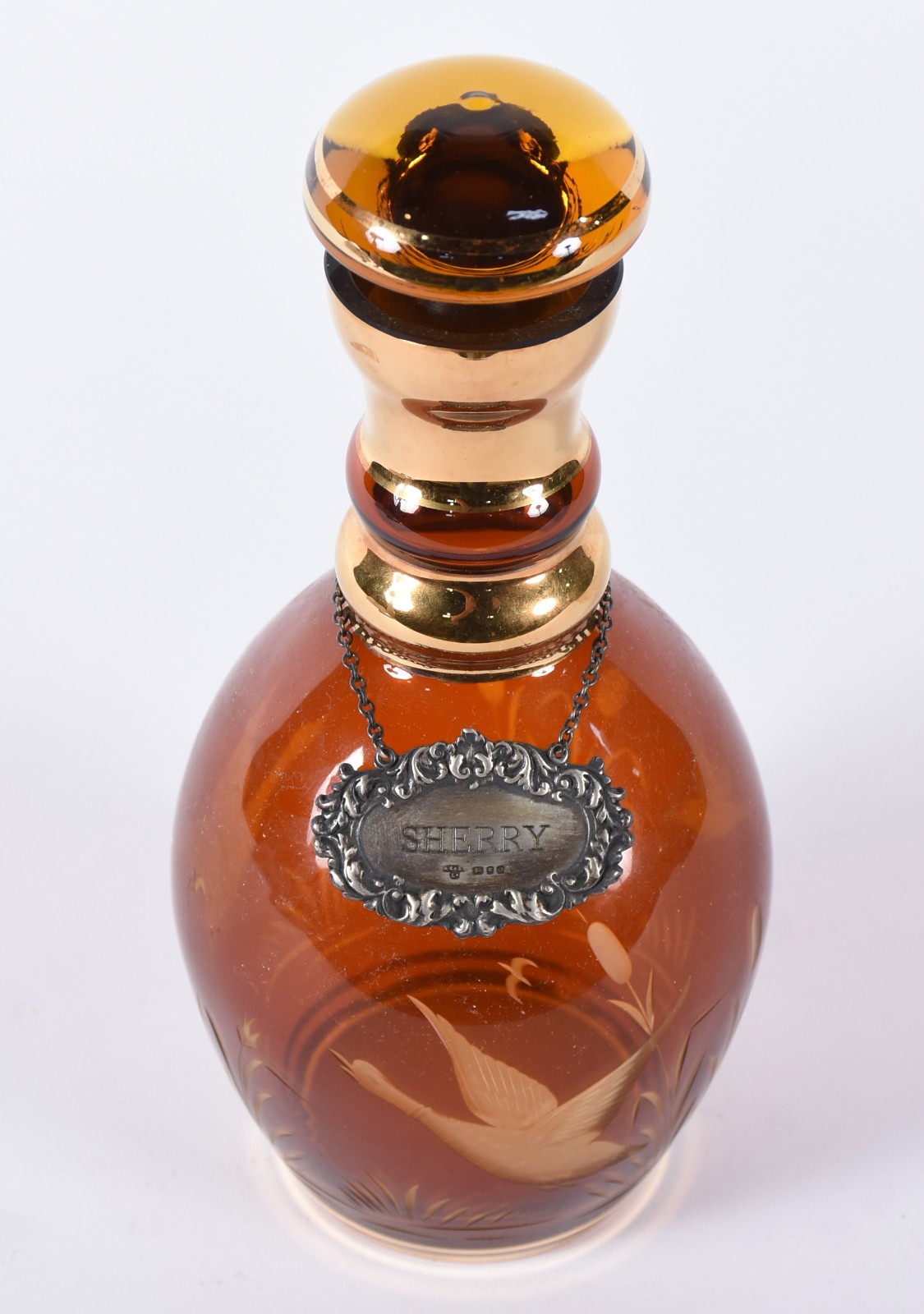 Garrafa de cristal na cor âmbar com pássaro lavrado e realces... - foto 3 de 5