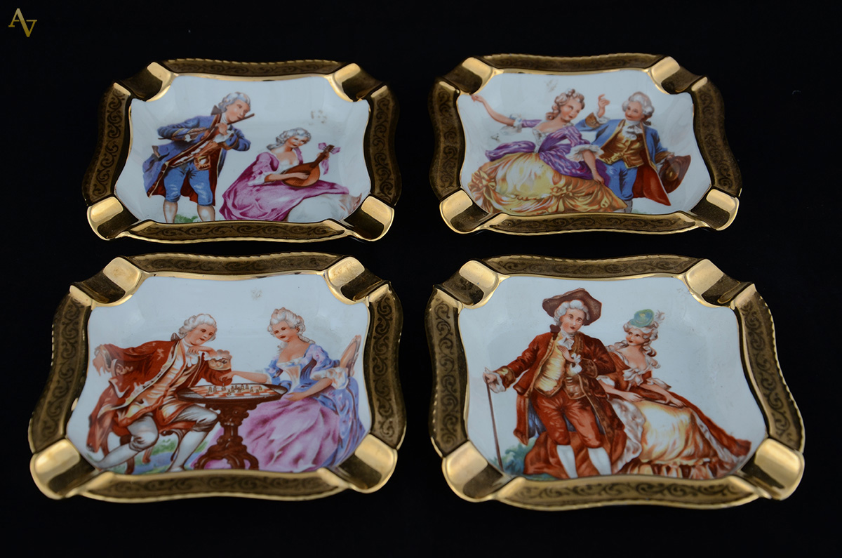 Quatro cinzeiros de porcelana decorados com figuras em policromia e... - foto 1 de 2